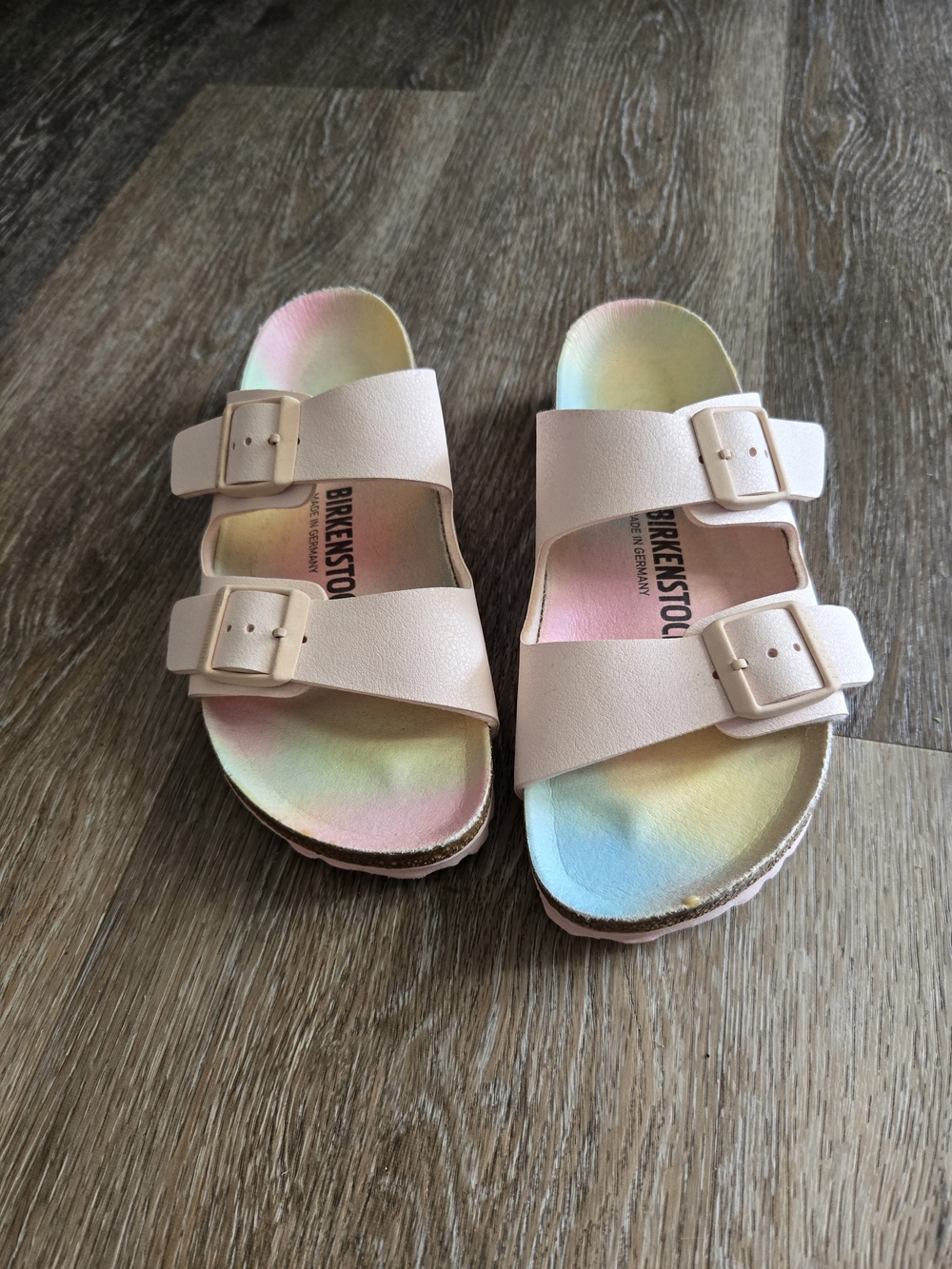 Birkenstock Dual-Strap Sandals in Light Pink with Pastel Rainbow Footbed